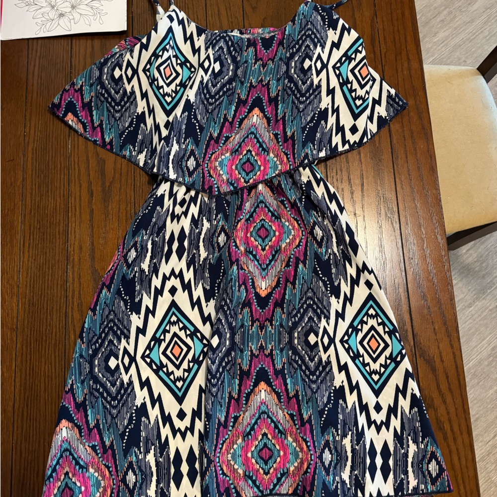 Multicolor sundress with cut back.